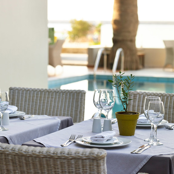 Rethymno Main Restaurant table by the pool